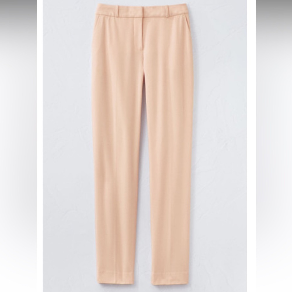 Midrise sits blw waist 31" inseam Taprd strt leg w/ 16" openg Angld f & b pckts